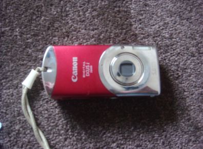 Canon Ixus Zoom- as small as a phone to fit in pocket