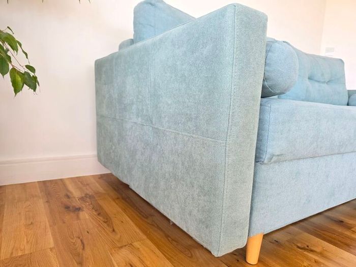 Sofa Bed. Sleeping fuction with Storage container. Comfortable sleep for your guests. High quality materials. Impeccable condition. Decorative pillows included.