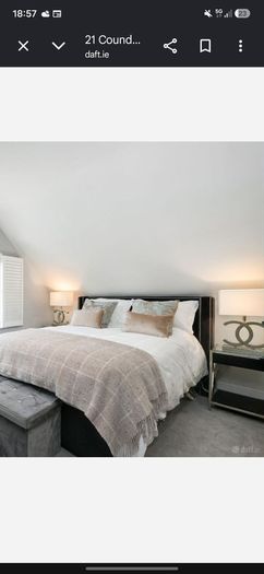 Striking Pair of designer type chrome table lamps with white shades