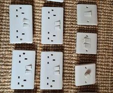 Assortment of Electrical Sockets and Switches