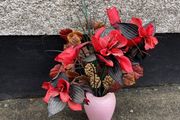Beautiful arrangement of Artificial flowers in Mottled vase
