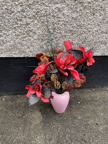 Beautiful arrangement of Artificial flowers in Mottled vase