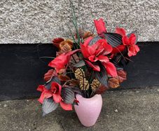 Beautiful arrangement of Artificial flowers in Mottled vase