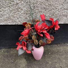 Beautiful arrangement of Artificial flowers in Mottled vase