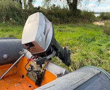 Mariner 30hp outboard or trailer.