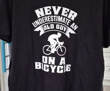 Never Underestimate An Old Guy on a Bicycle Mens Black Cotton T-Shirt