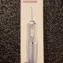 Smart Electric Water Flosser with Precision Pressure Control, Rotating Nozzle, new, unopened. Image 4