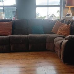 Corner sofa and recliner armchair
