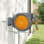 Retractable Hose Reel Wall Mounted, 30-2m Garden Hose Pipe Reel with Lock, Auto Rewind, 7 in 1 Spray Nozzle, Includes Wall Fixings, 180 Swivel, Outdoor Watering, 59 x 23 x 42 cm, Orange Image 3