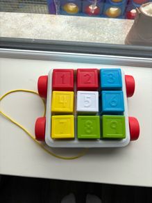Fisher price pull along block holder