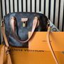 Authentic Louis Vuitton Rivoli MM Image 2