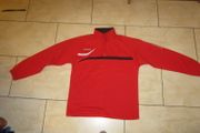 Errea  red sports top   size MED