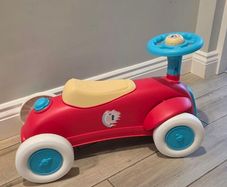 Children's tricycle and little car