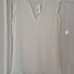 Winter white flowy sleeveless ladies top