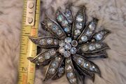 Costume brooch.