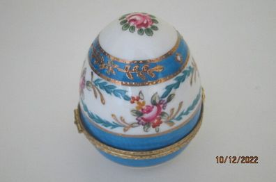 Beautifully painted ceramic egg trinket box