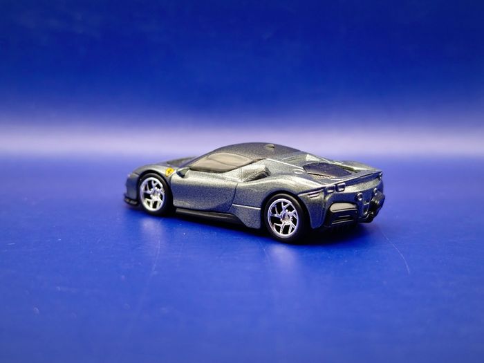 Hot Wheels Ferrari SF90 Stradale with custom wheels.