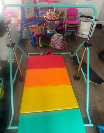 gymnastics bar (as new) with landing mat