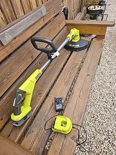 Lawnmower and strimmer.