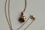 An elegant 925 sterling silver pendant on a chain.