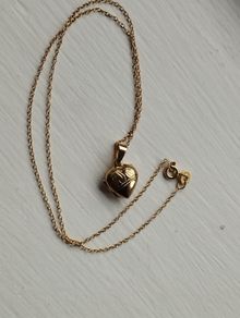 An elegant 925 sterling silver pendant on a chain.