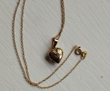 An elegant 925 sterling silver pendant on a chain.