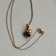 An elegant 925 sterling silver pendant on a chain.