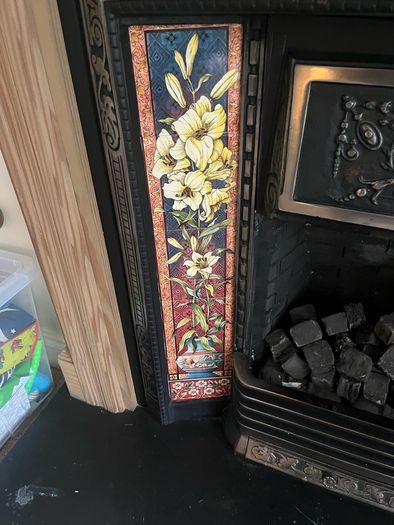 Wooden Fireplace with Tiled Cast Iron Surround