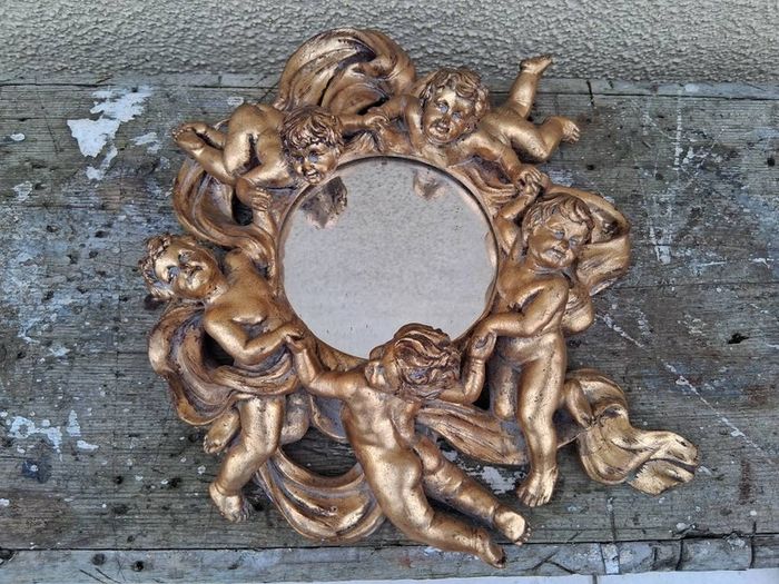 baroque cherub mirror