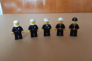 LEGO Town 5 Vintage Police and Firefighter Minifigures from 1980s. Used in good condition.