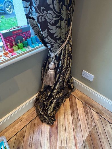 Pair of large lined black and gold curtains