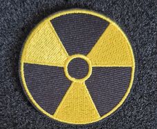 Nuclear warning symbol, cloth patch.