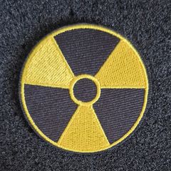 Nuclear warning symbol, cloth patch.