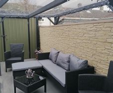 Garden furniture sofa chairs and table