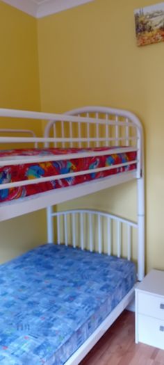 white metal bunk beds