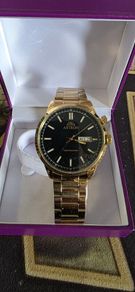 Brand new in the box gold plated Astron Hybrid watch