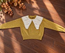 Brand new Designer sweater Size S-M