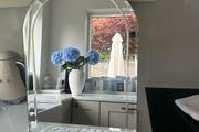 Arched bevel-edge mirror