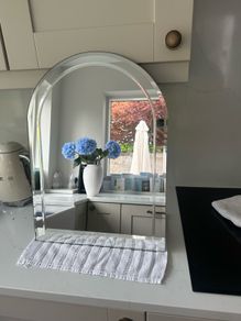 Arched bevel-edge mirror