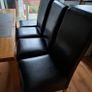 4 Black leather style kitchen chairs. Very few scuff marks 80 Image 6