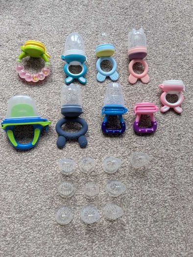 Assorted baby fruit feeders and teethers
