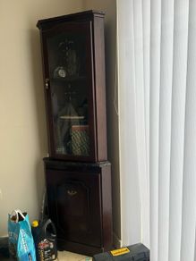 Two Brown Corner Shelves