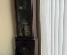 Two Brown Corner Shelves
