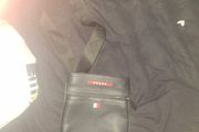 prada manbag shoulder strap broken