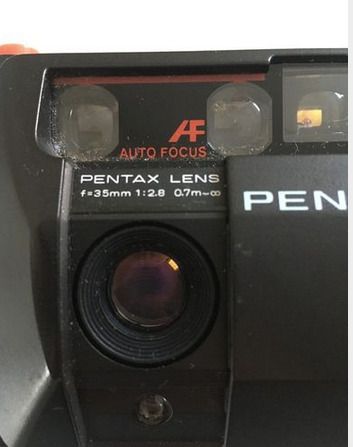 Pentax 35mm camera and lens