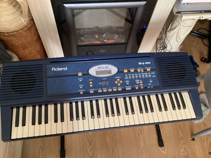EM-10 Creative Keyboard with music stand and keyboard stand in excellent working condition for quick sale