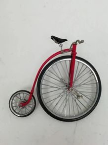 1:10 scale die-cast metal replica of a Red Penny-farthing bicycle.