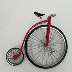 1:10 scale die-cast metal replica of a Red Penny-farthing bicycle.