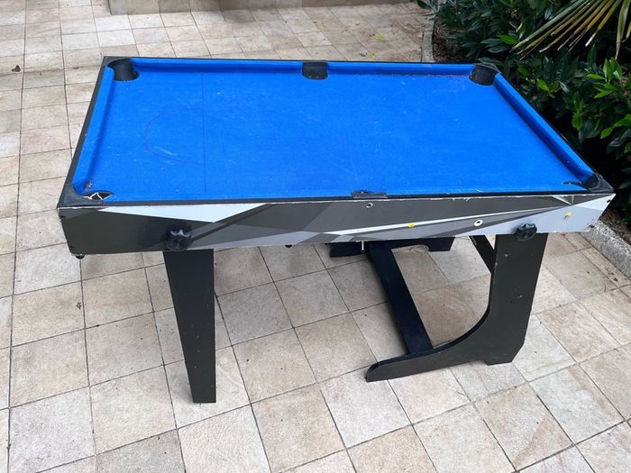 Two in one table soccer and pool