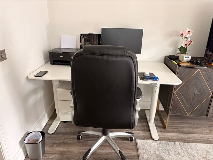 Electric sit to stand desk,chair and cabinet.